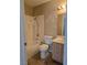 Bathroom featuring a shower-tub combo, tile surround, and a single sink vanity at 2116 Bavington Dr # C, Las Vegas, NV 89108
