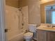 Bathroom featuring a shower-tub combo, vanity, and a toilet at 2116 Bavington Dr # C, Las Vegas, NV 89108
