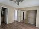 Comfortable bedroom boasts wood floors and a mirrored closet with sliding doors at 2116 Bavington Dr # C, Las Vegas, NV 89108