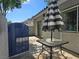 View of a patio featuring a table and umbrella at 2116 Bavington Dr # C, Las Vegas, NV 89108
