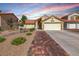 Charming single-story home featuring a two-car garage and landscaped front yard at 234 Geronimo Ct, Henderson, NV 89074