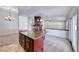 Spacious living area featuring fireplace and kitchen access at 234 Geronimo Ct, Henderson, NV 89074