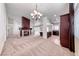 Bright and spacious living room featuring a fireplace and access to kitchen at 234 Geronimo Ct, Henderson, NV 89074