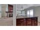 Living room view featuring a kitchen and outdoor access at 234 Geronimo Ct, Henderson, NV 89074