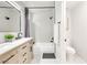 Modern bathroom with double vanity, soaking tub, and separate toilet room at 2429 Worchester Rd, Henderson, NV 89074