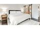 Calm and inviting bedroom featuring a barn door to the en suite bathroom at 2429 Worchester Rd, Henderson, NV 89074