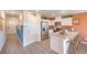 Stylish kitchen features stainless steel appliances and a breakfast bar at 2510 Petunia Garden St # 227, North Las Vegas, NV 89081