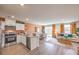Cozy living room with lots of natural light and modern decor at 2510 Petunia Garden St # 227, North Las Vegas, NV 89081