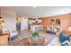 Open floor plan with a seamless transition from living to dining to the stylish kitchen at 2510 Petunia Garden St # 227, North Las Vegas, NV 89081