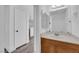 Clean bathroom featuring a wood vanity and ample counter space at 2661 Ruthe Duarte Ave, Las Vegas, NV 89121