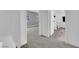 Hallway view of a bathroom and bedroom featuring a connecting doorway at 2661 Ruthe Duarte Ave, Las Vegas, NV 89121
