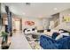 Bright living room features stylish furniture, chic decor, and plenty of space to relax and entertain at 2806 Calle Cadiz, Henderson, NV 89044