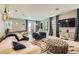 Bright living room features stylish furniture, chic decor, and plenty of space to relax and entertain at 2806 Calle Cadiz, Henderson, NV 89044