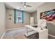 Bright office space with modern desk, chair, and ceiling fan at 2806 Calle Cadiz, Henderson, NV 89044