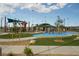 Community playground area with various play structures and seating at 2806 Calle Cadiz, Henderson, NV 89044