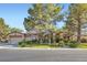 Attractive single-Gathering home with well-maintained landscaping, three-car garage, and inviting curb appeal at 313 Glenridding St, Las Vegas, NV 89183