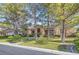 Attractive single-Gathering home with a well-kept lawn, mature trees, and a welcoming facade at 313 Glenridding St, Las Vegas, NV 89183