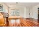Open living room with hardwood floors, abundant natural light, and versatile layout at 313 Glenridding St, Las Vegas, NV 89183
