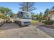 Large parking area suitable for an RV with easy access to the backyard and landscaping at 313 Glenridding St, Las Vegas, NV 89183