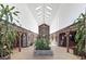 Grand hallway with stone accents, skylights, tile floor, and multiple doorways at 3330 Wedo Way, North Las Vegas, NV 89031