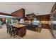 Gourmet kitchen with custom cabinetry, granite countertops, and chef-grade appliances at 3330 Wedo Way, North Las Vegas, NV 89031