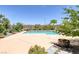 Backyard swimming pool with concrete patio and desert landscaping at 3330 Wedo Way, North Las Vegas, NV 89031