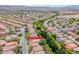 Bird's eye view showcases home's location on 4044 Villeroy Avenue with park and green spaces at 4044 Villeroy Ave, Las Vegas, NV 89141