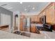 Spacious kitchen with stainless steel appliances, granite countertops, and ample cabinet space at 4044 Villeroy Ave, Las Vegas, NV 89141