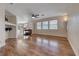 Bright and airy living room with hardwood floors, fireplace, and ample natural light at 4044 Villeroy Ave, Las Vegas, NV 89141