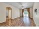 Open living room with hardwood floors and sliding doors to outdoor space at 4044 Villeroy Ave, Las Vegas, NV 89141