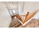 Elegant staircase with wooden banister and carpeted steps leading to the upper level at 4044 Villeroy Ave, Las Vegas, NV 89141