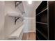 Spacious walk-in closet with built-in shelving and a hanging rod for ample storage and organization at 4044 Villeroy Ave, Las Vegas, NV 89141