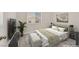 Stylishly furnished bedroom with a comfortable bed, modern decor, and plenty of natural light at 4132 Joyous St, North Las Vegas, NV 89032