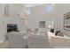 Bright, open living room with soaring ceilings and stylish, neutral decor creates an inviting space at 4132 Joyous St, North Las Vegas, NV 89032