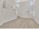 Spacious living room with high ceilings, large windows and neutral walls at 4132 Joyous St, North Las Vegas, NV 89032