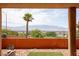 Scenic backyard showcasing xeriscaping and mountain views, framed by a covered patio, creating a serene outdoor space at 414 Crystal Canyon Dr, Mesquite, NV 89027