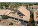Inviting backyard with deck, desert landscaping, patio, and shade at 414 Crystal Canyon Dr, Mesquite, NV 89027