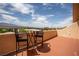 Balcony with a table, chairs and a beautiful view at 414 Crystal Canyon Dr, Mesquite, NV 89027