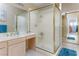 Bright bathroom featuring a sink vanity, a large shower and neutral colors at 414 Crystal Canyon Dr, Mesquite, NV 89027