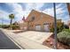 Charming home with three-car garage, lovely desert landscape and great curb appeal at 414 Crystal Canyon Dr, Mesquite, NV 89027