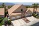 Inviting exterior with three-car garage, lush greenery, and well-maintained landscaping at 414 Crystal Canyon Dr, Mesquite, NV 89027
