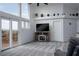 Cozy living room featuring a TV and access to a balcony at 414 Crystal Canyon Dr, Mesquite, NV 89027