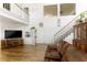 Bright living room with hardwood floors, and entertainment center at 414 Crystal Canyon Dr, Mesquite, NV 89027