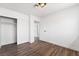 Bedroom features closet for storage space with wood-look flooring and neutral walls at 4312 Chrysalis Dr, Las Vegas, NV 89121
