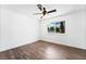 Bright, airy bedroom features wood floors, neutral paint, and modern ceiling fan at 4312 Chrysalis Dr, Las Vegas, NV 89121