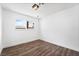Bedroom view shows a window view and natural light with wood-look flooring at 4312 Chrysalis Dr, Las Vegas, NV 89121