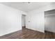 Clean bedroom features wood-look flooring and a closet for storage space at 4312 Chrysalis Dr, Las Vegas, NV 89121