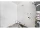 Bare utility room with hot water heater, plumbing fixtures, and concrete flooring at 4312 Chrysalis Dr, Las Vegas, NV 89121