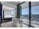 Spa-like bathroom featuring freestanding tub, views, and seamless access to bedroom at 4381 W Flamingo Rd # 1121, Las Vegas, NV 89103