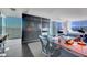 Spacious living area featuring modern furnishings, a desk area, and floor-to-ceiling windows with beautiful views at 4381 W Flamingo Rd # 1121, Las Vegas, NV 89103